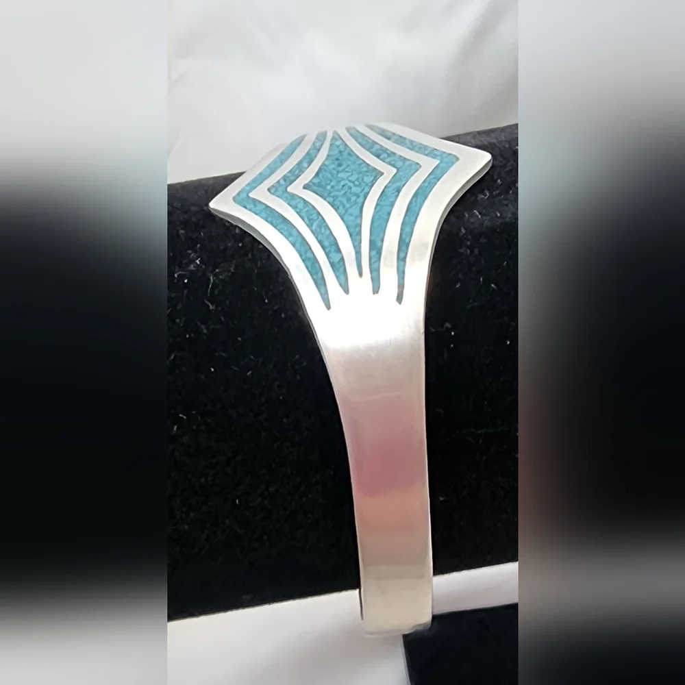 Vintage Sterling Silver Taxco Cuff Bracelet with turquoise inlay.